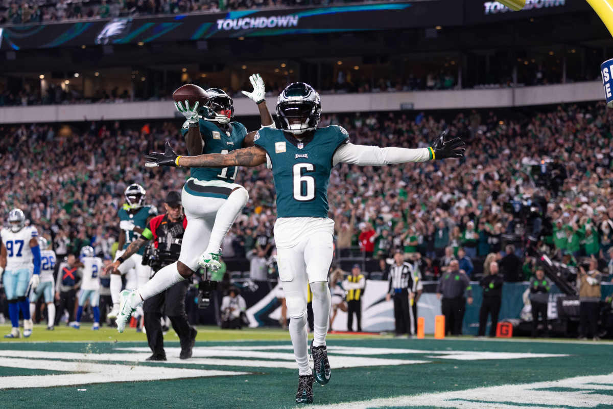Philadelphia Eagles receivers DeVonta Smith and A.J. Brown celebrate a touchdown. 